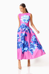 Sybella A-Line Midi Dress in Pink & Blue Floral with a boat neckline &  cap sleeves posed shot