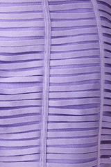 Brunette model wearing the Alya Strapless Midi Dress in purple detail shot