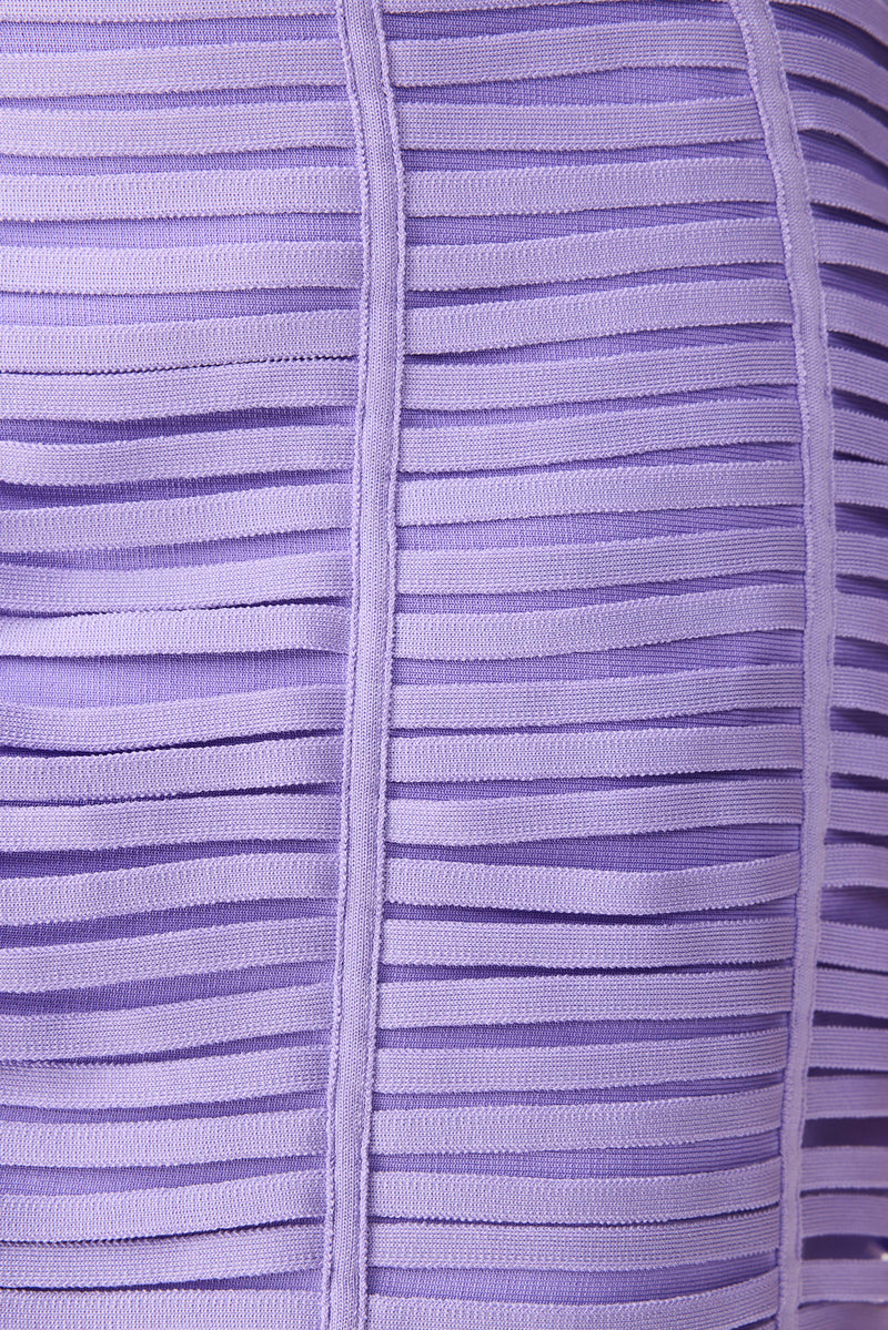 Brunette model wearing the Alya Strapless Midi Dress in purple detail shot