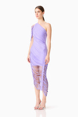 Brunette model wearing the Alya Asymmetrical Midi Dress in Purple side shot 