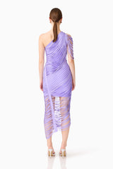 Brunette model wearing the Alya Asymmetrical Midi Dress in Purple back shot 