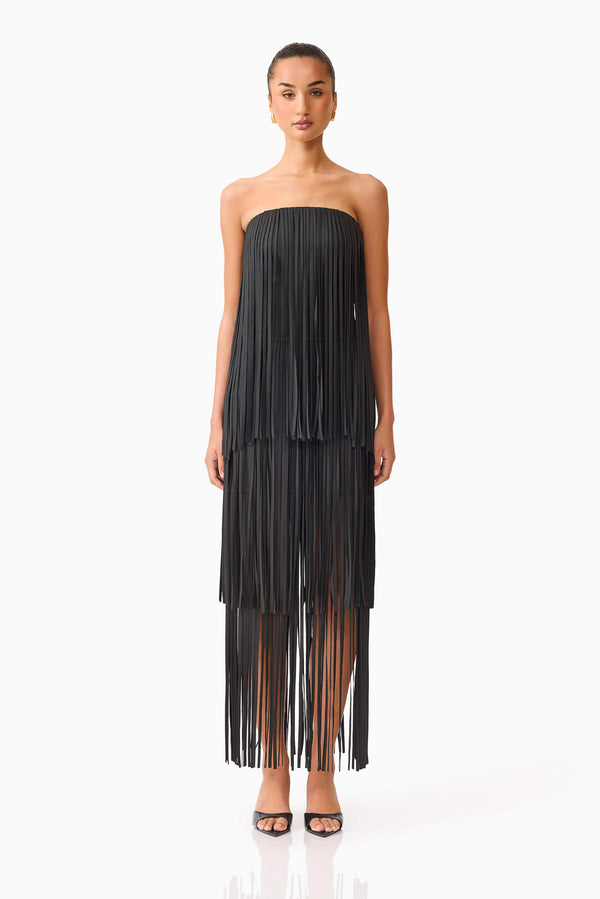 Brunette model wearing the Alya Tiered Maxi Dress in Black front shot
