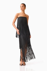 Blonde model wearing the Alya Tiered Maxi Dress in Black posed shot