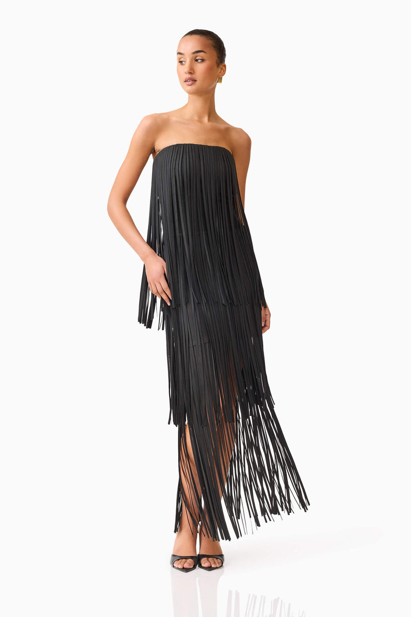 Blonde model wearing the Alya Tiered Maxi Dress in Black posed shot