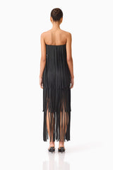 Brunette model wearing the Alya Tiered Maxi Dress in Black back shot