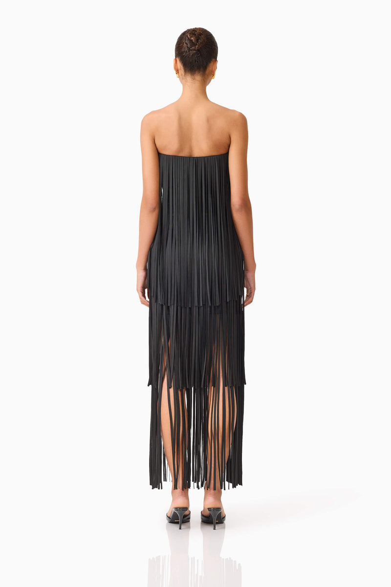 Brunette model wearing the Alya Tiered Maxi Dress in Black back shot