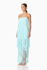 Brunette model wearing the Alya Tiered Maxi Dress in Blue side shot