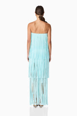 Brunette model wearing the Alya Tiered Maxi Dress in Blue back shot
