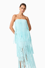 Brunette model wearing the Alya Tiered Maxi Dress in Blue close up posed shot