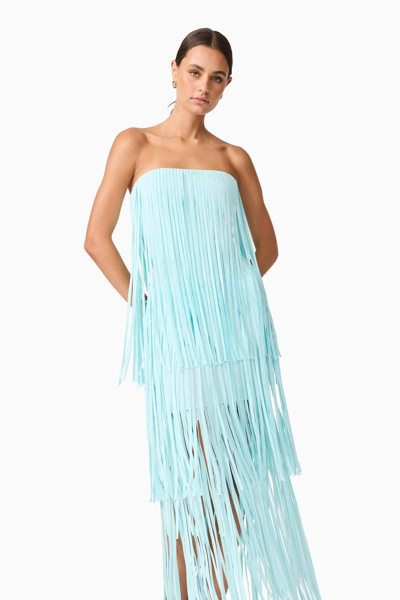 Brunette model wearing the Alya Tiered Maxi Dress in Blue close up posed shot