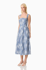 Brunette model wearing the Safia Midi Dress in Blue side shot