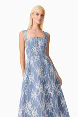 Brunette model wearing the Safia Midi Dress in Blue close up shot