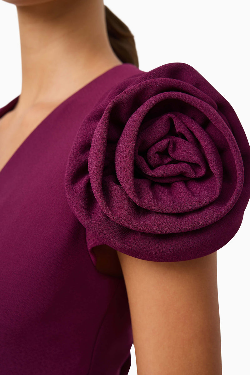 Brunette model wearing Theresa V-Neck Mini Dress in Burgundy detail shot
