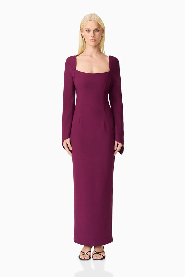Blonde model wearing the Theresa Long Sleeve Gown in Burgundy front shot