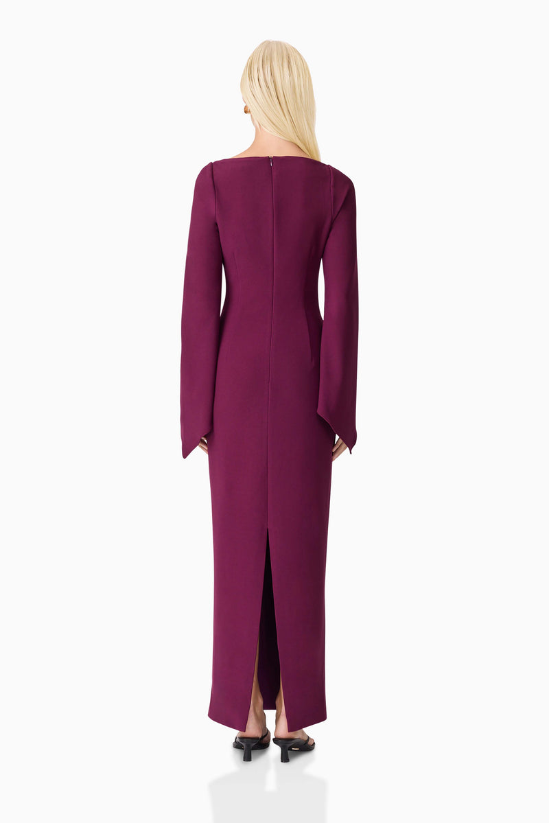 Blonde model wearing the Theresa Long Sleeve Gown in Burgundy back shot