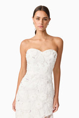 Brunette model wearing Carol Strapless Gown in White close up shot