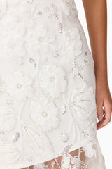 Brunette model wearing Carol Strapless Gown in White detail shot