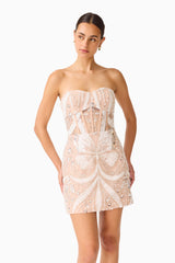 Orvella Embellished Mini Dress in White & Beige with sweetheart neckline & bodice boning close up hands on hips shot
