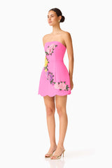 Laurentia Tulip Mini Dress in Fuchsia Pink with strapless neckline & floral embroidered trim side shot