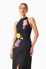 Laurentia Maxi Gown in Fuchsia Black with collared halter neckline and asymmetric peplum detail close up shot