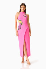 Laurentia Halter Maxi in Fuchsia Pink with front slit & floral embroidered detailing posed shot