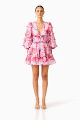 Fleuris Long Sleeve Mini Dress in Pink Floral with ruffle detailing & printed georgette fabrication front shot