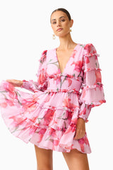 Fleuris Long Sleeve Mini Dress in Pink Floral with ruffle detailing & printed georgette fabrication close up shot