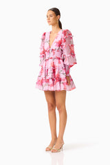 Fleuris Long Sleeve Mini Dress in Pink Floral with ruffle detailing & printed georgette fabrication side shot