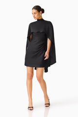 Auriella Mini Dress in Black with removable cape & high neckline posed shot