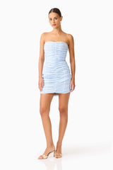 Florencea Ruched Mini Dress in Powder Blue with strapless neckline & mesh fabrication posed shot