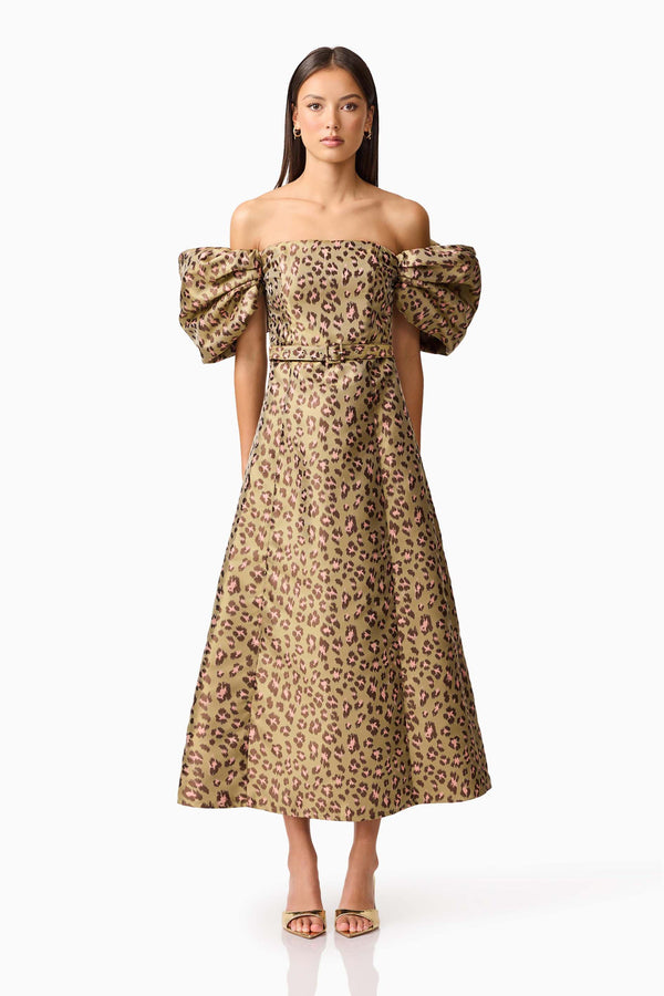 Brunette model wearing the Elara Off The Shoulder Mini Dress in Leopard Print front shot