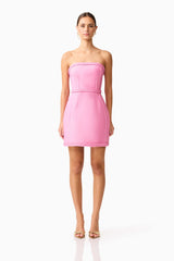 Brunette model wearing Coralene Puff Sleeve Midi Dress in Pink front shot