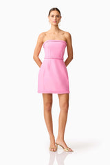 Brunette model wearing Coralene Puff Sleeve Midi Dress in Pink posed shot