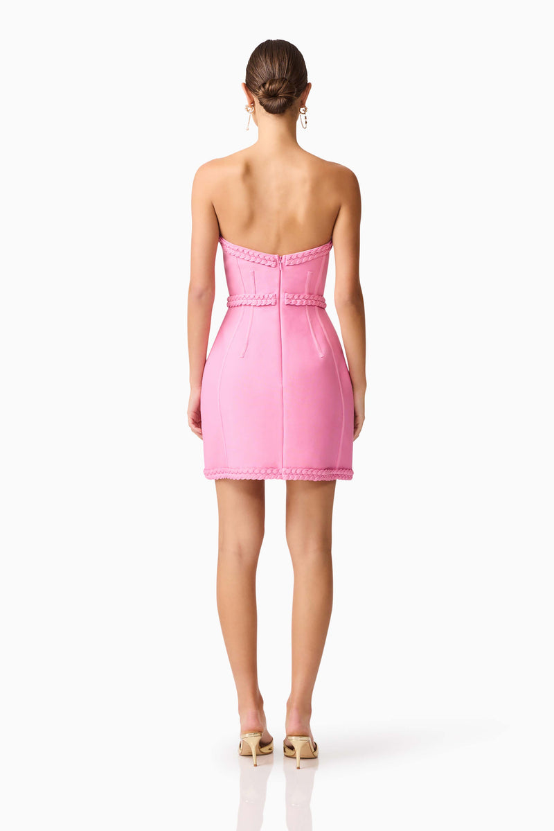 Brunette model wearing Coralene Puff Sleeve Midi Dress in Pink back shot