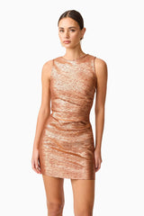 Brunette model wearing the Rhian Fitted Mini Dress in Orange Posed Close Up Shot