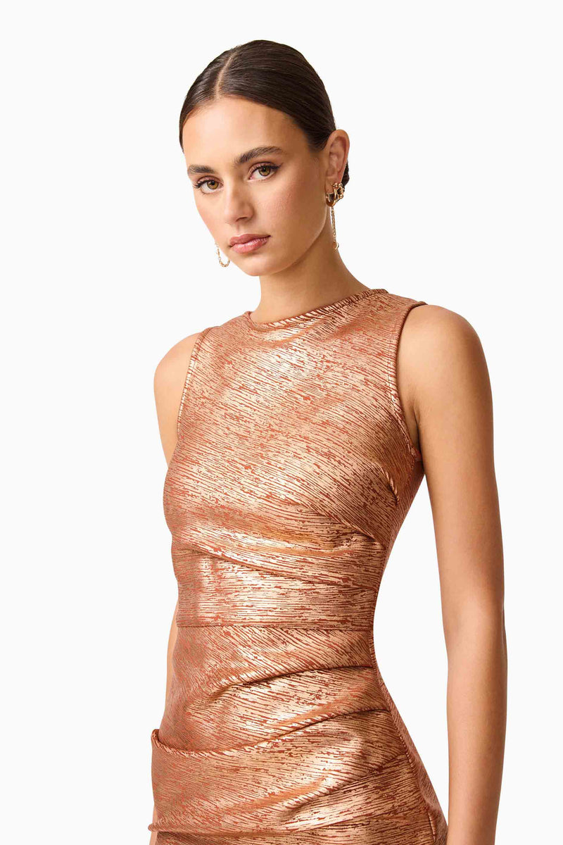 Brunette model wearing the Rhian Fitted Mini Dress in Orange Close Up Shot