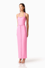 Brunette model wearing Coralene Halter Gown in Pink side shot