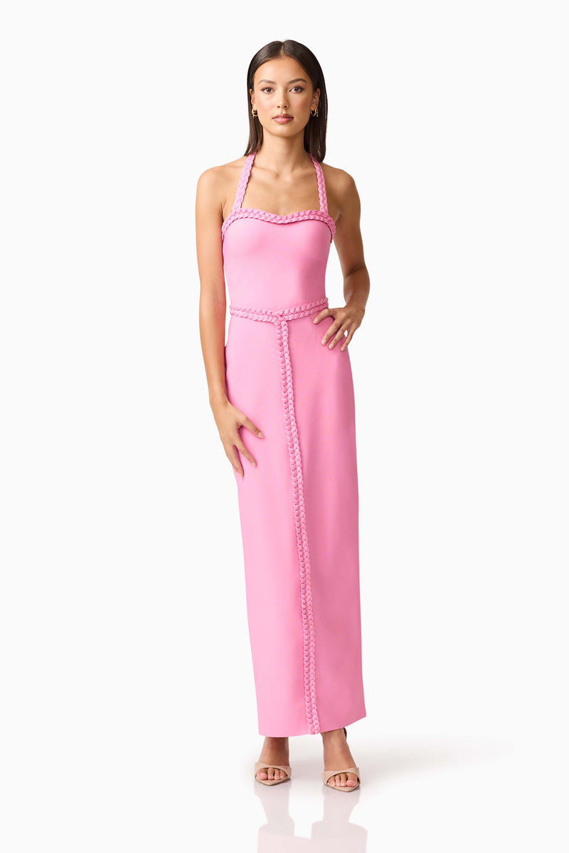 Brunette model wearing Coralene Halter Gown in Pink posed shot