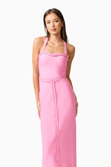 Brunette model wearing Coralene Halter Gown in Pink hands on hip shot
