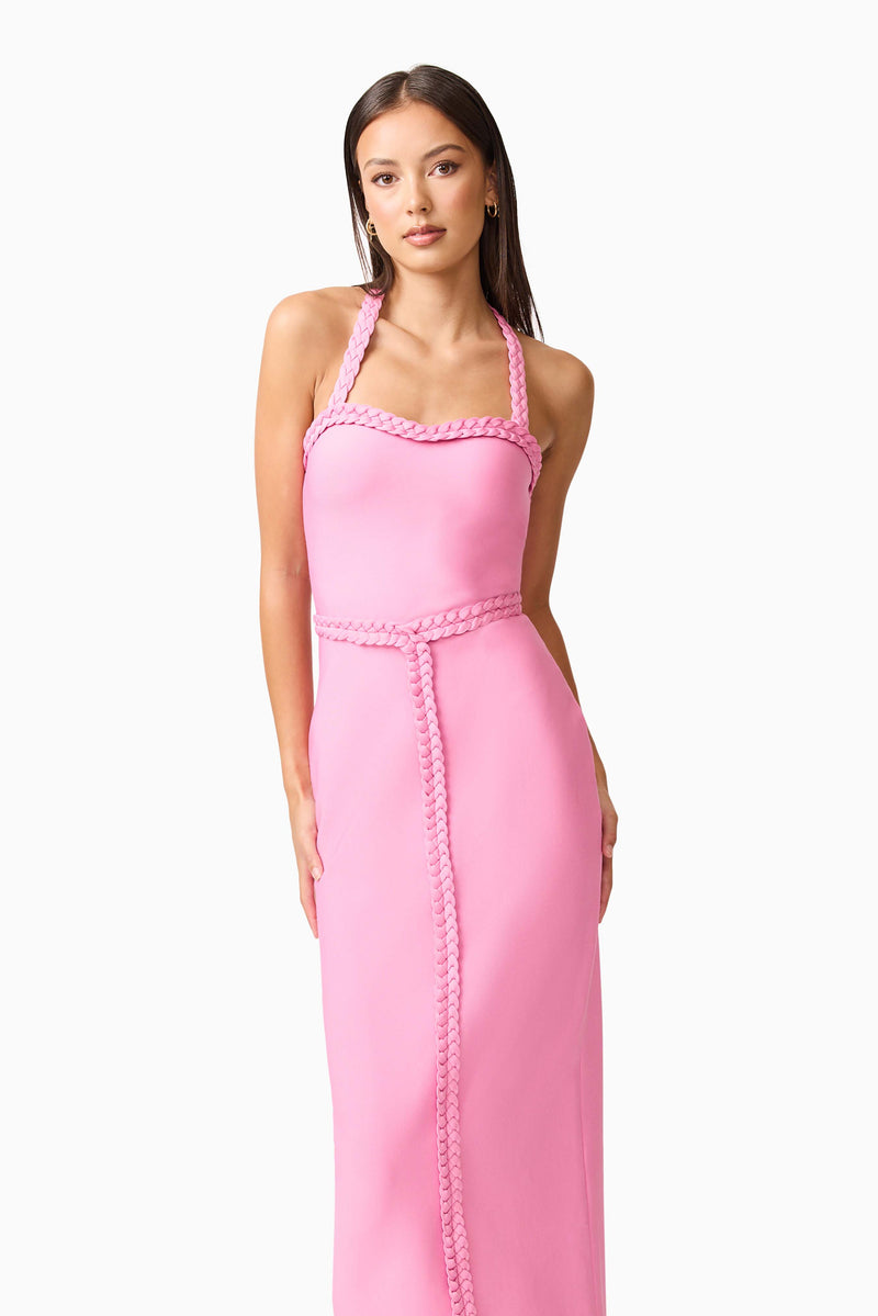 Brunette model wearing Coralene Halter Gown in Pink hands on hip shot