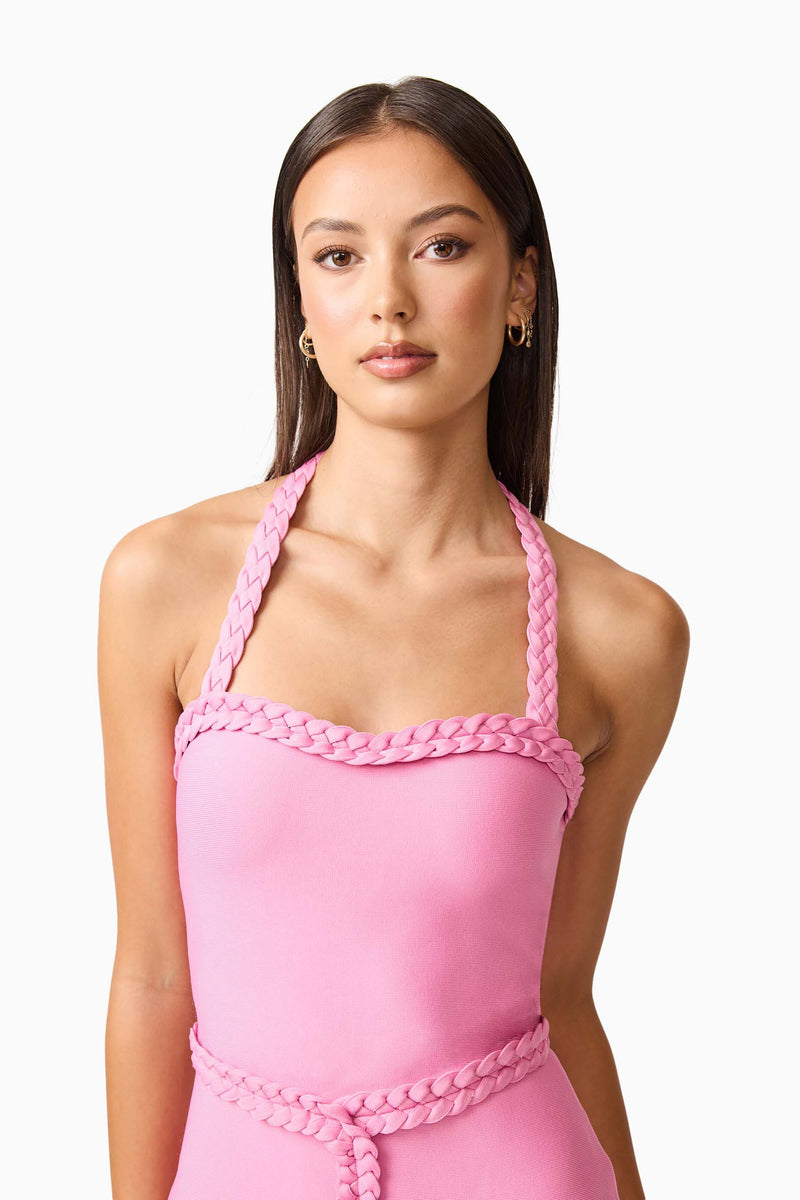 Brunette model wearing Coralene Halter Gown in Pink close up shot