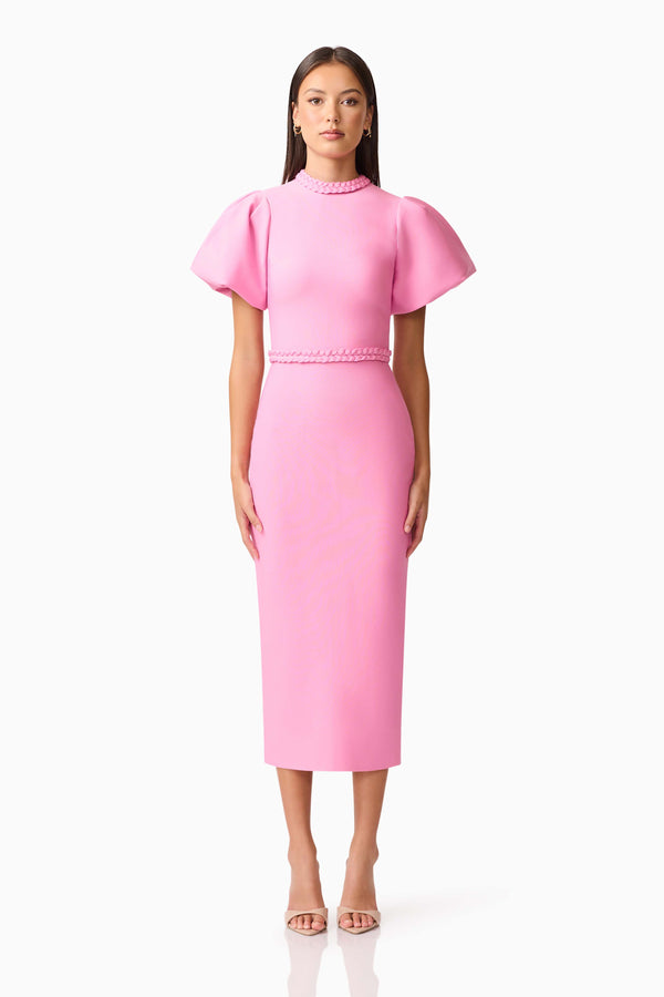 Brunette model wearing Coralene Puff Sleeve Midi Dress in Pink front shot