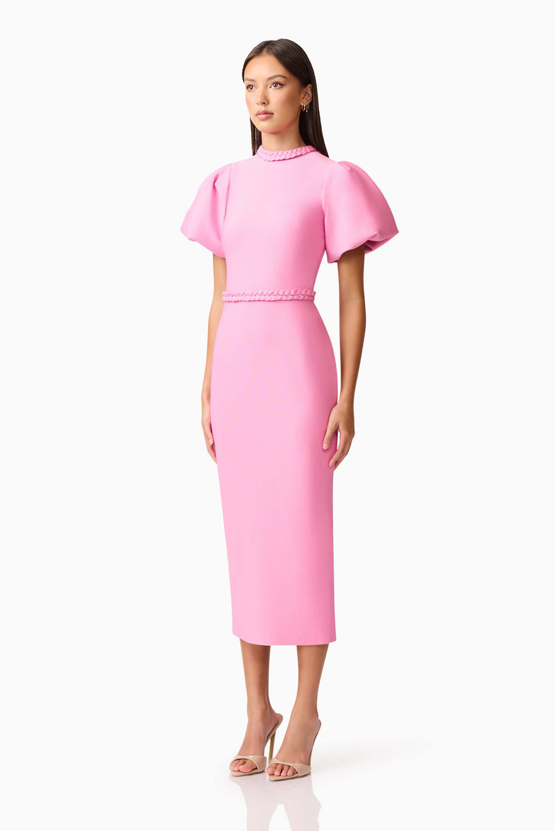 Brunette model wearing Coralene Puff Sleeve Midi Dress in Pink side shot