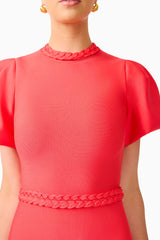 Blonde model wearing the Coralene Puff Sleeve Midi Dress in Red detail shot