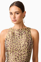 Brunette model wearing Elara Tulip Mini Dress in Leopard Print close up shot
