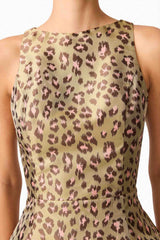 Brunette model wearing Elara Tulip Mini Dress in Leopard Print detailed shot