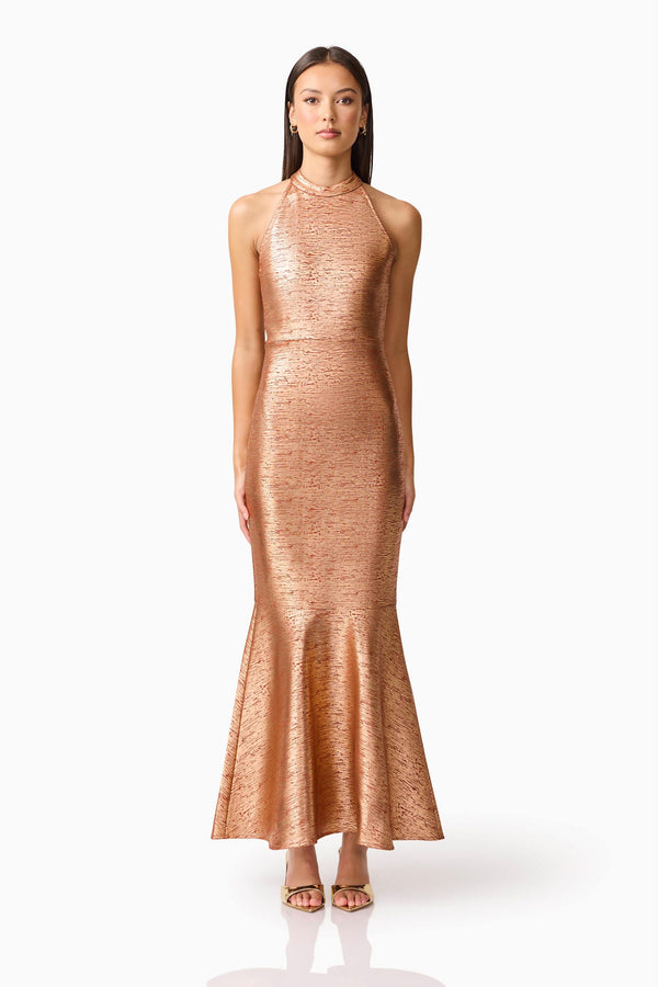 Brunette Model wearing the Rhian Halter Gown in Orange Front Shot