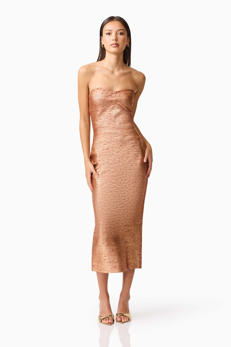 Brunette model wearing the Rhian Strapless Midi Dress in Orange Posed Shot