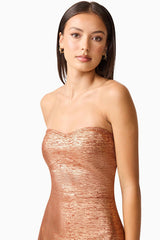 Brunette model wearing the Rhian Strapless Midi Dress in Orange Detail Shot