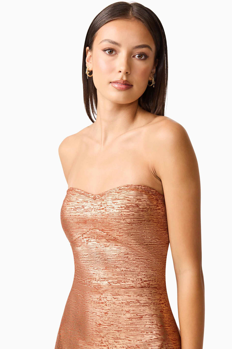 Brunette model wearing the Rhian Strapless Midi Dress in Orange Detail Shot